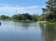 Calm waterway view with lush greenery and a clear sky at 329 54Th Ave. N, North Myrtle Beach, SC 29582