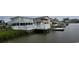 Two-story home with private deck and waterway access at 329 54Th Ave. N, North Myrtle Beach, SC 29582