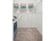 Spacious walk-in closet with built-in shelving and hanging rods at 115 Talladega Dr. # 405, Myrtle Beach, SC 29579
