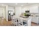 Modern kitchen with white cabinets, granite countertops, and stainless steel appliances at 115 Talladega Dr. # 405, Myrtle Beach, SC 29579