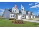 Row of new townhouses with attached garages and landscaping at 115 Talladega Dr. # 405, Myrtle Beach, SC 29579