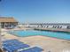 Inviting outdoor pool with plenty of lounge chairs at 9550 Shore Dr. # 619, Myrtle Beach, SC 29572