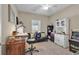 Home office with a desk, futon, and white cabinet at 1459 Tiger Grand Dr., Conway, SC 29526