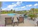 Pool and patio with seating overlooking pond at 1459 Tiger Grand Dr., Conway, SC 29526