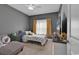 Bedroom with a twin bed, TV, and chevron wall at 1459 Tiger Grand Dr., Conway, SC 29526