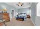 Serene bedroom with light blue walls and a comfortable bed at 1459 Tiger Grand Dr., Conway, SC 29526