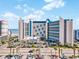 Oceanfront hotel with parking and palm trees at 7100 Ocean Blvd. N # 925, Myrtle Beach, SC 29572