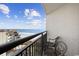 Oceanfront balcony with chairs, offering stunning ocean and beach views at 7100 Ocean Blvd. N # 925, Myrtle Beach, SC 29572