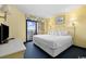 King bedroom with ocean view and TV at 7100 Ocean Blvd. N # 925, Myrtle Beach, SC 29572