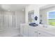 Elegant bathroom with double vanity and large shower at 192 Hadley Springs Ave, Longs, SC 29568