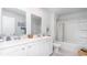 Clean bathroom with double vanity and bathtub at 192 Hadley Springs Ave, Longs, SC 29568