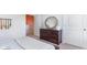 Coastal-themed bedroom with dresser and large mirror at 192 Hadley Springs Ave, Longs, SC 29568