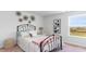 Charming bedroom with metal bed frame and window seat at 192 Hadley Springs Ave, Longs, SC 29568