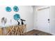 Bright entryway with glass console table and coastal-themed decor at 192 Hadley Springs Ave, Longs, SC 29568