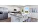Kitchen boasts white cabinets, granite countertops, and stainless steel appliances at 192 Hadley Springs Ave, Longs, SC 29568
