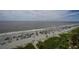 Aerial view of a beach with many colorful umbrellas at 201 74Th Ave. N # 2829, Myrtle Beach, SC 29572