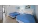 Bright bedroom with two double beds, and ocean-themed decor at 201 74Th Ave. N # 2829, Myrtle Beach, SC 29572
