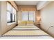 Small bedroom with yellow bedding and ocean views at 1605 S Ocean Blvd. # 1104, Myrtle Beach, SC 29577