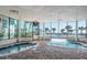 Indoor hot tubs with large windows overlooking pool at 1605 S Ocean Blvd. # 1104, Myrtle Beach, SC 29577