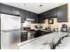 Modern kitchen with stainless steel appliances and granite countertops at 1605 S Ocean Blvd. # 1104, Myrtle Beach, SC 29577