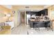 Modern kitchen with dark cabinets and breakfast bar at 1605 S Ocean Blvd. # 1104, Myrtle Beach, SC 29577