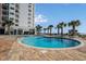 Inviting resort-style pool with plenty of lounge chairs at 1605 S Ocean Blvd. # 1104, Myrtle Beach, SC 29577