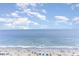 Beach with people and umbrellas under a bright sky at 1605 S Ocean Blvd. # 1104, Myrtle Beach, SC 29577