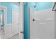Small bathroom with shower and light blue walls at 6001-N37 S Kings Hwy., Myrtle Beach, SC 29575