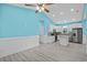 Bright kitchen with white cabinets, granite countertops, and stainless steel appliances at 6001-N37 S Kings Hwy., Myrtle Beach, SC 29575