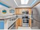 Galley-style kitchen with stainless steel appliances at 5308 N Ocean Blvd. # 812, Myrtle Beach, SC 29577