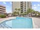 Inviting outdoor swimming pool with surrounding lounge chairs at 5308 N Ocean Blvd. # 812, Myrtle Beach, SC 29577
