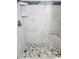 Shower with marble tile and pebble floor at 5308 N Ocean Blvd. # 812, Myrtle Beach, SC 29577