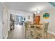 Condo dining area with table and four chairs at 5308 N Ocean Blvd. # 812, Myrtle Beach, SC 29577