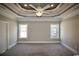 Main bedroom featuring a tray ceiling and ceiling fan at 1100 Maccoa Dr., Conway, SC 29526