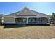 Home with large backyard, screened porch, and patio at 1100 Maccoa Dr., Conway, SC 29526