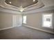Large main bedroom with tray ceiling and ceiling fan at 1100 Maccoa Dr., Conway, SC 29526