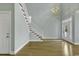 Spacious entryway with hardwood floors and staircase at 6 Cottage Dr., Murrells Inlet, SC 29576