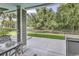 Private backyard patio with water view and outdoor grill at 6 Cottage Dr., Murrells Inlet, SC 29576