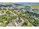Aerial view showcasing home's location near water and town at 6 Cottage Dr., Murrells Inlet, SC 29576