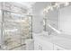 Modern bathroom with marble shower and white vanity at 1012 Maccoa Dr., Conway, SC 29526