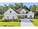 Two story home with gray siding, stone accents and a large yard at 1012 Maccoa Dr., Conway, SC 29526