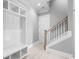 Bright foyer with built-in bench seating and stairway at 1012 Maccoa Dr., Conway, SC 29526