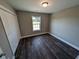 Bright bedroom with double doors and dark laminate flooring at Tbd 4 Casey Dr., Nichols, SC 29581