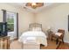 Cozy bedroom with a queen-size bed and hardwood floors at 355 Foxtail Dr., Longs, SC 29568