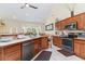 Open kitchen with stainless steel appliances and breakfast bar at 355 Foxtail Dr., Longs, SC 29568