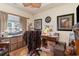 Bright home office features built-in shelving and hardwood floors at 355 Foxtail Dr., Longs, SC 29568