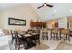Bright kitchen with an island, breakfast nook, and ample cabinet space at 355 Foxtail Dr., Longs, SC 29568