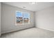 Well-lit bedroom featuring a large window at 702 Lightwood Dr., Conway, SC 29526