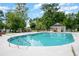 Inviting community pool with a spacious deck and seating area at 6458 Sweet Gum Trail, Myrtle Beach, SC 29588