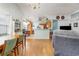 Bright dining area with kitchen view and hardwood floors at 6458 Sweet Gum Trail, Myrtle Beach, SC 29588